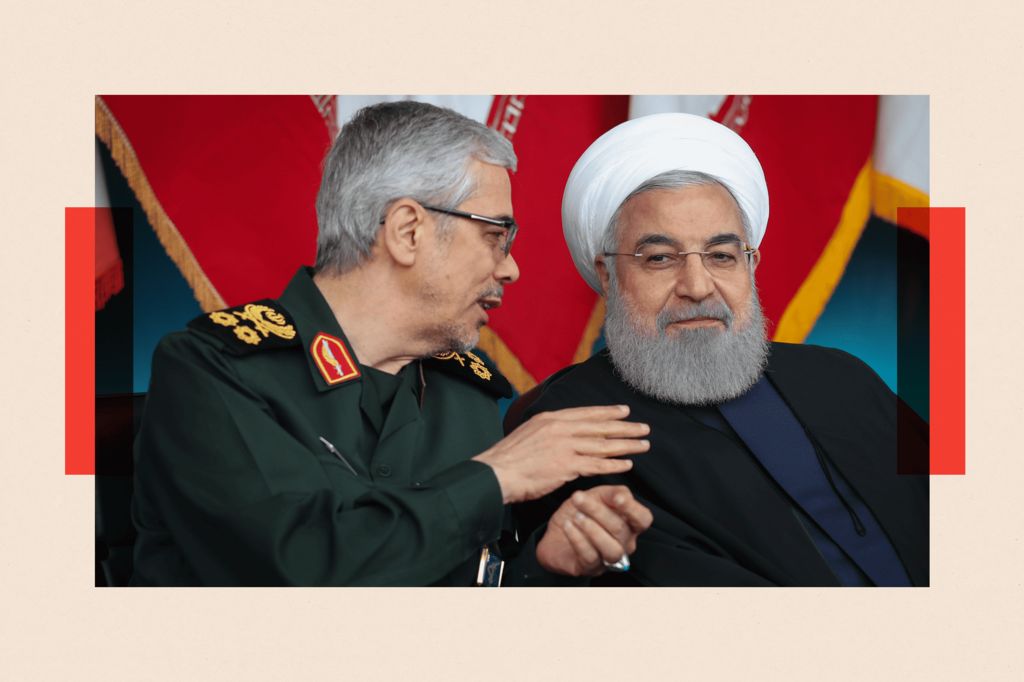 A file photo dated 18 April 2019 shows Iranian Chief of Staff Mohammad Bagheri and then-Iranian President Hassan Rouhani attending a military parade in Tehran, Iran.